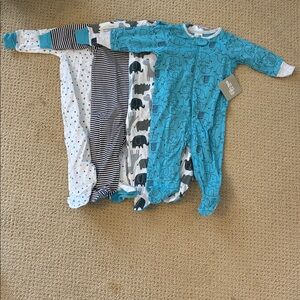 4 Pack Gerber Onesies Brand Footie Pajamas. 3-6 months. Brand New.